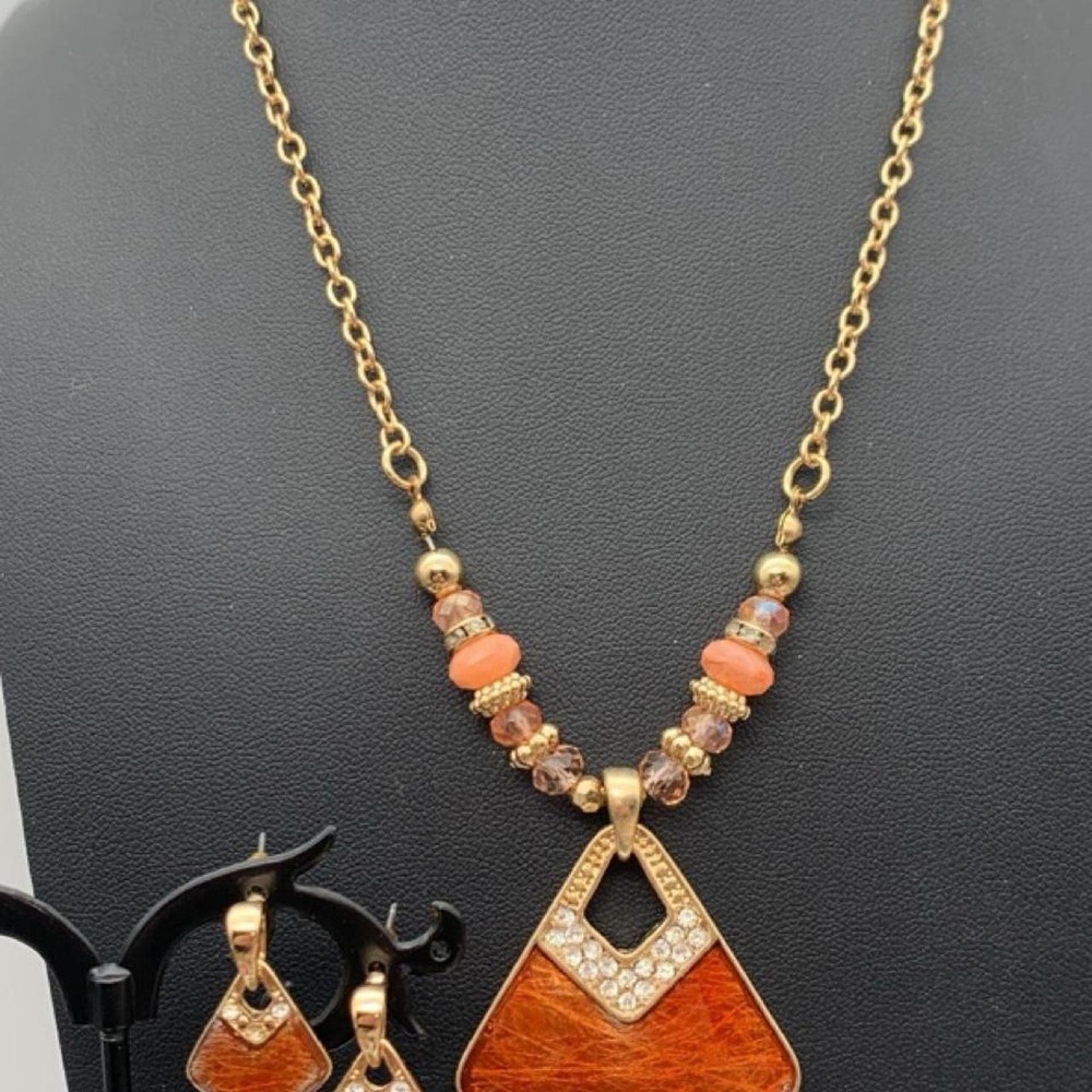 Gold tone and orange enamel & rhinestone necklace and earring set